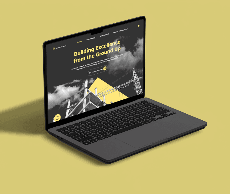 macbook featuring website on yellow background