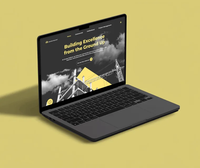 macbook featuring website on yellow background