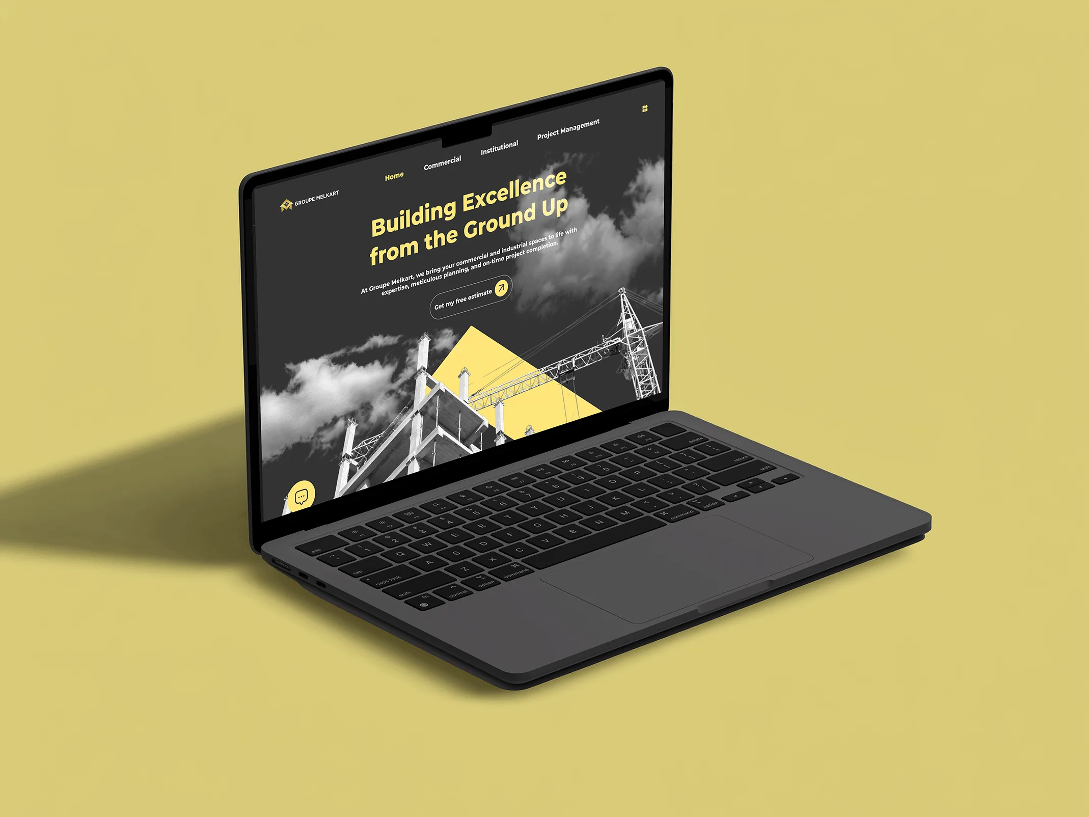 macbook featuring website on yellow background