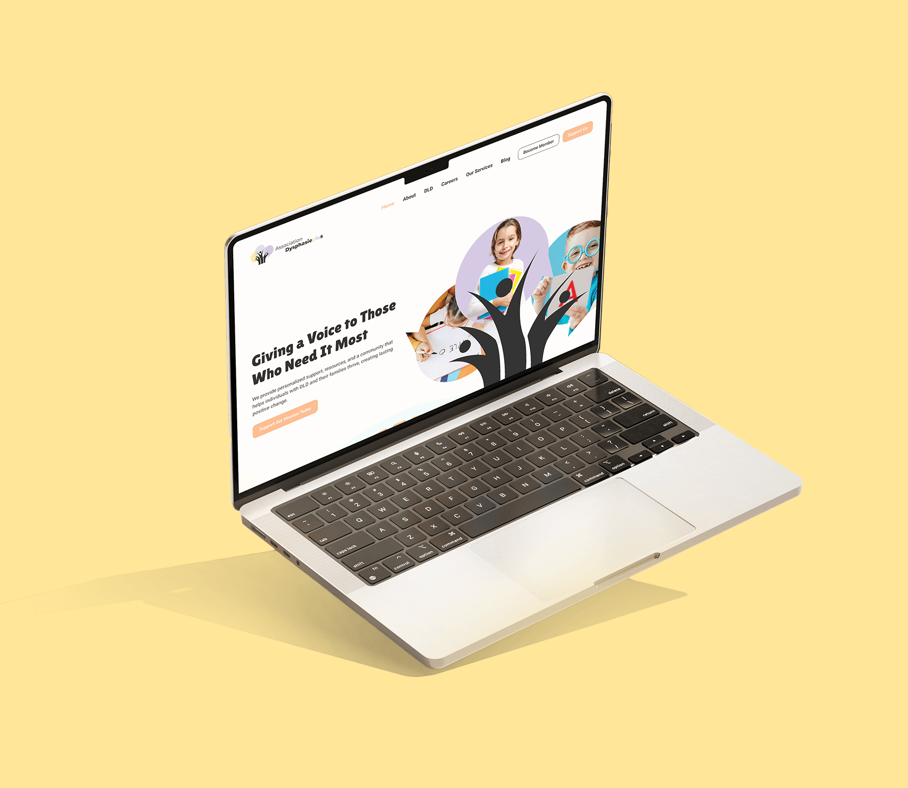 Dysphasie+ homepage design displayed on a MacBook mockup