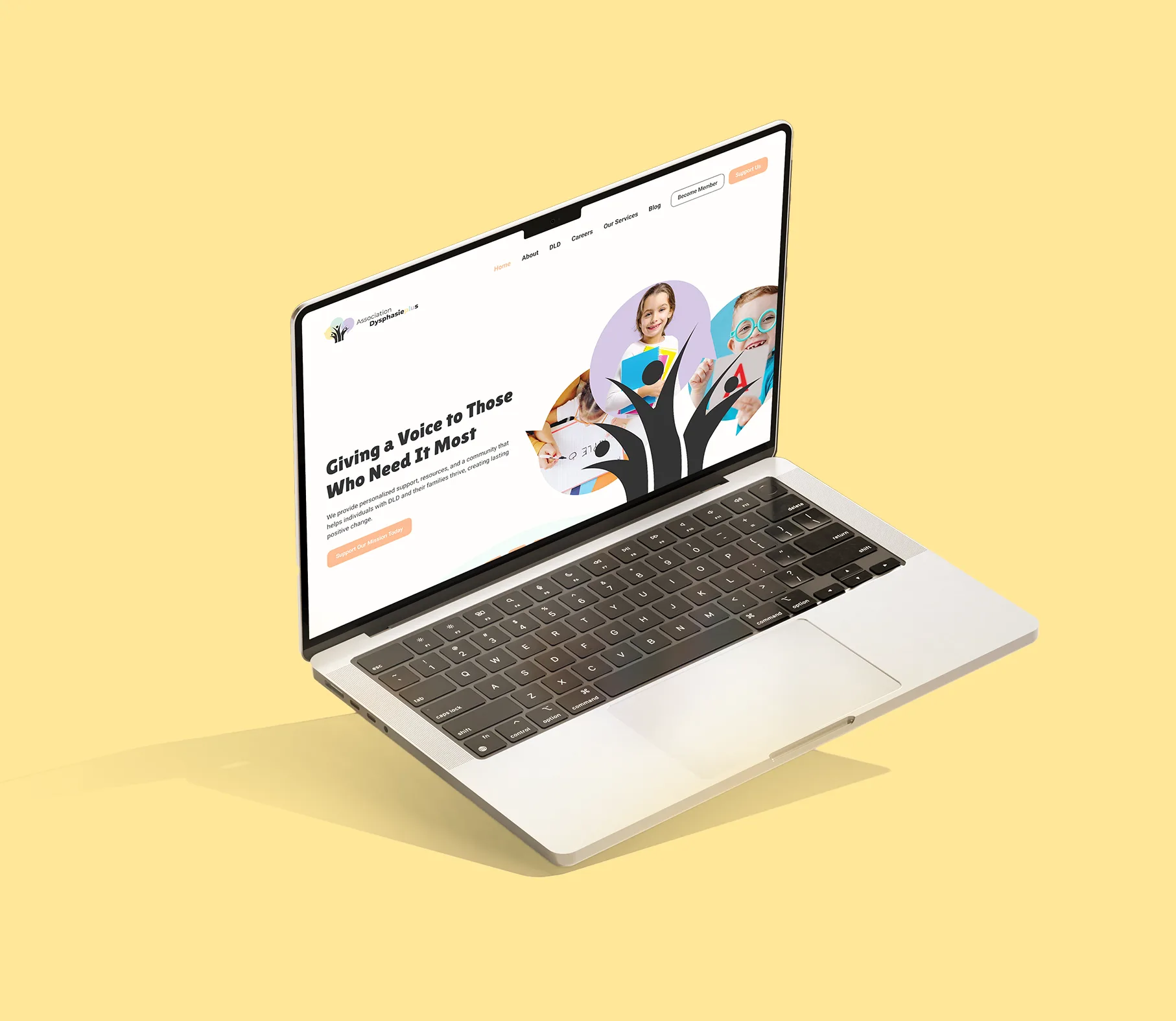 Dysphasie+ homepage design displayed on a MacBook mockup