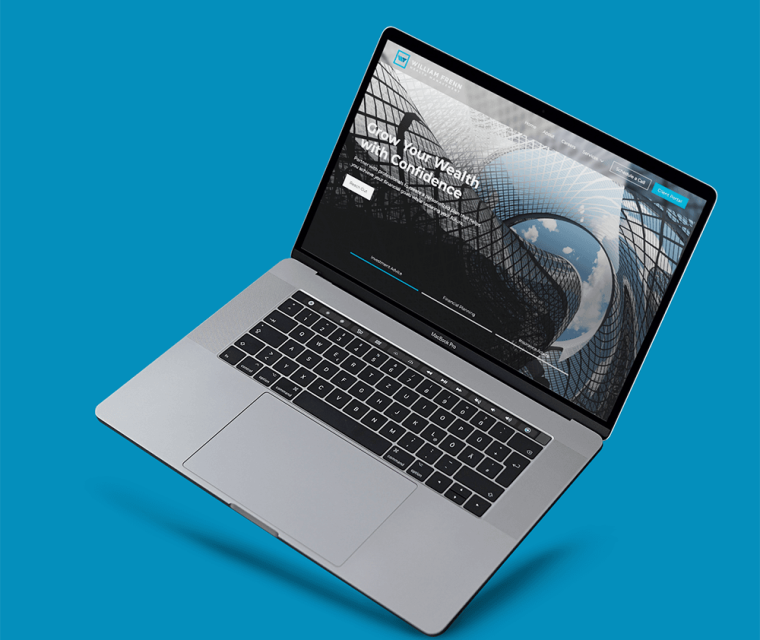 william frenn homepage ui design_on macbook mockup against blue background