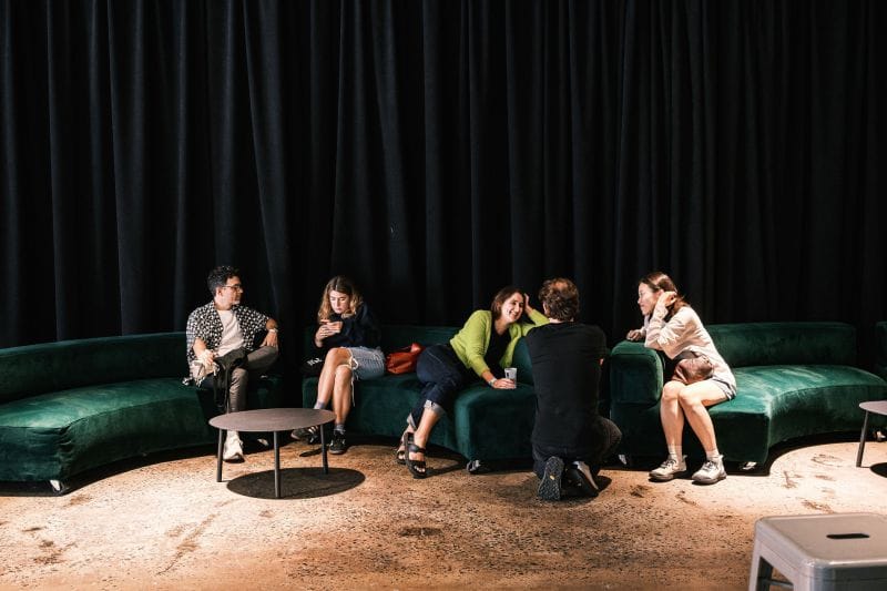 OFFF Montréal attendees talking together inside the SAT during the 2026 festival