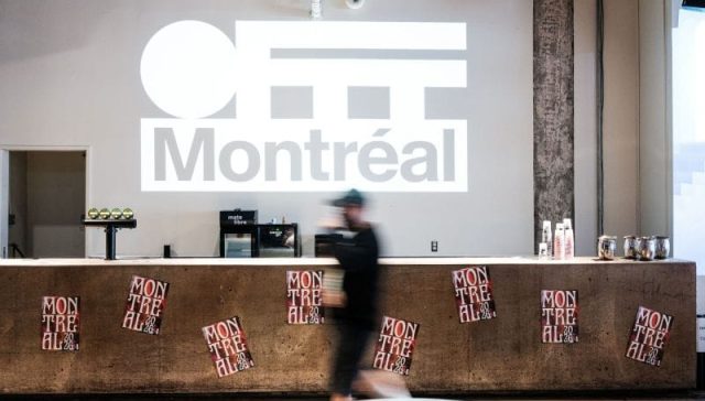 OFFF Montréal branding projected inside the SAT venue during the 2026 festival