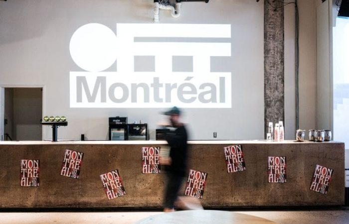 OFFF Montréal branding projected inside the SAT venue during the 2026 festival